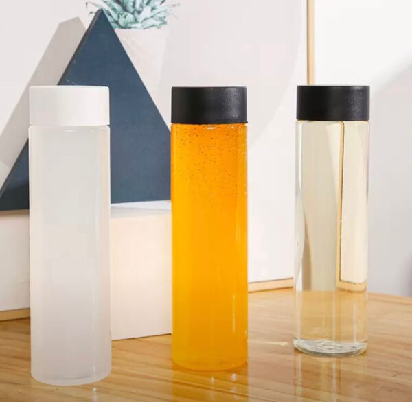 ROUND LONG BOTTLE WITH BLACK LID - Image 2